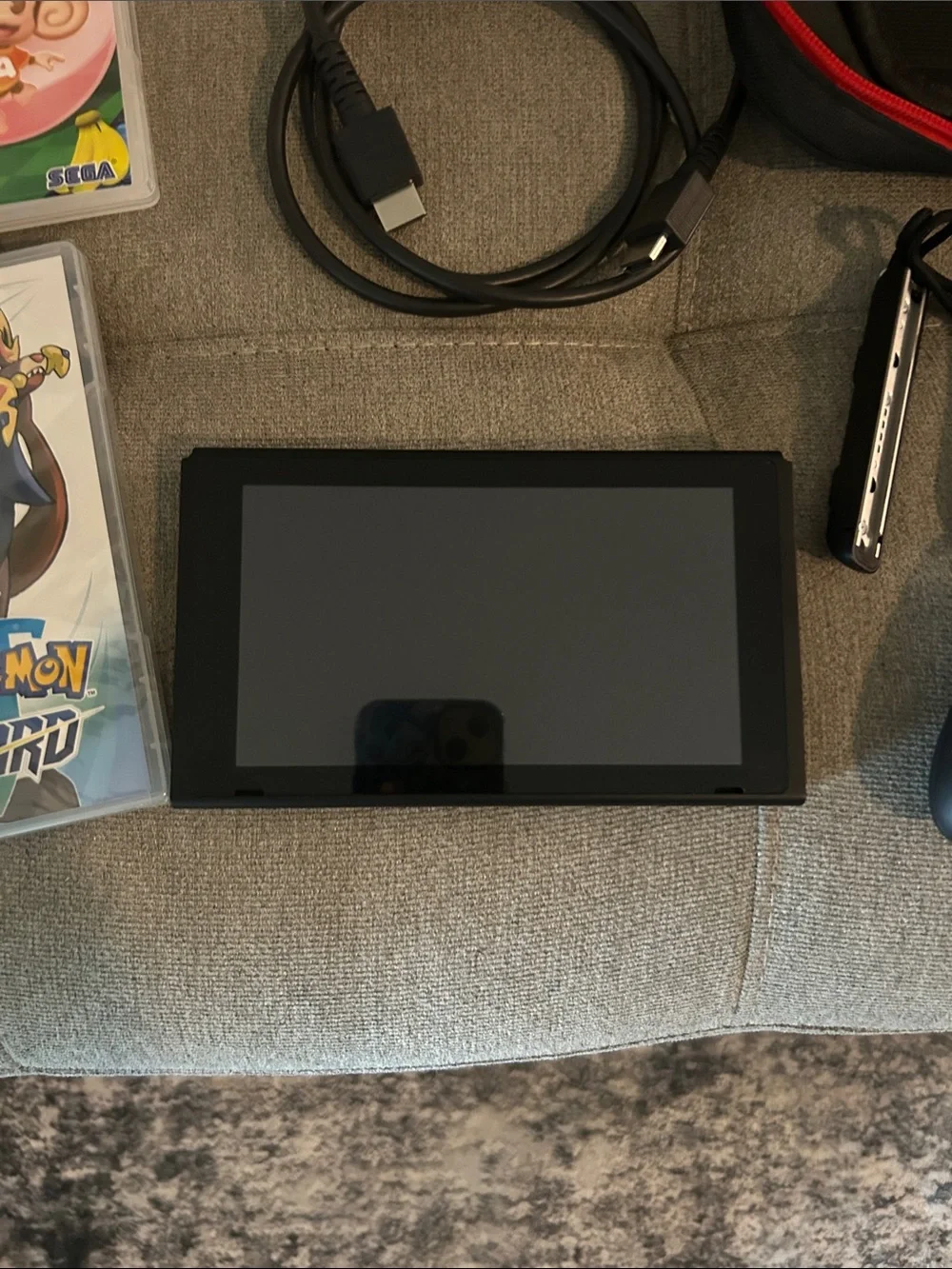 Nintendo Switch with Neon Blue & Neon Red Joy‑Con and Accessories